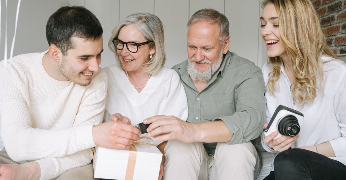 Multiple generations of a family sharing gifts together